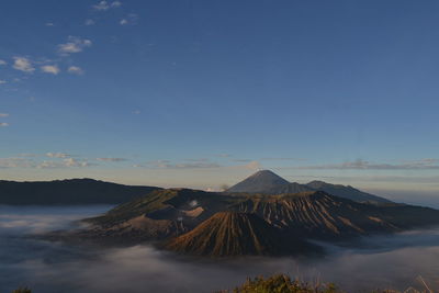 View of volcanic landscape against sky