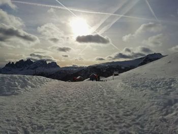 Scenic view of snowcapped mountains against sky