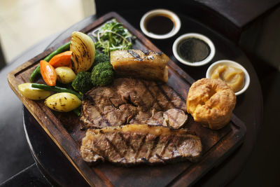 Close-up of meat on barbecue grill