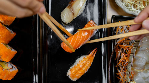 Midsection of person preparing food