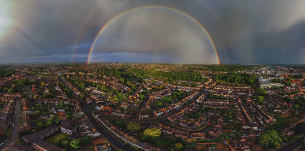 A full rainbow over the town of ipswich in suffolk, uk
