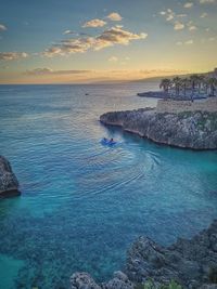 Scenic view of sea against sky during sunset