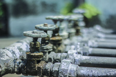 Close-up of valves on pipes