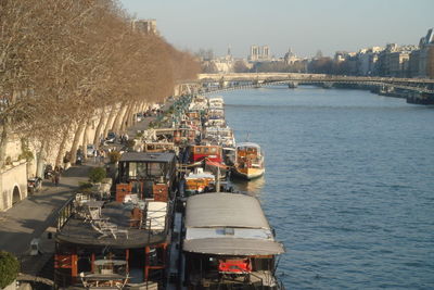 High angle view of boats moored at harbor