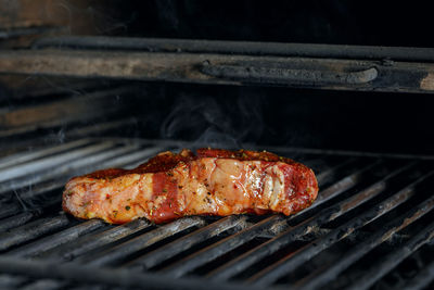 Close-up of meat on barbecue grill