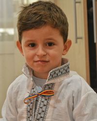 Portrait of cute boy at home