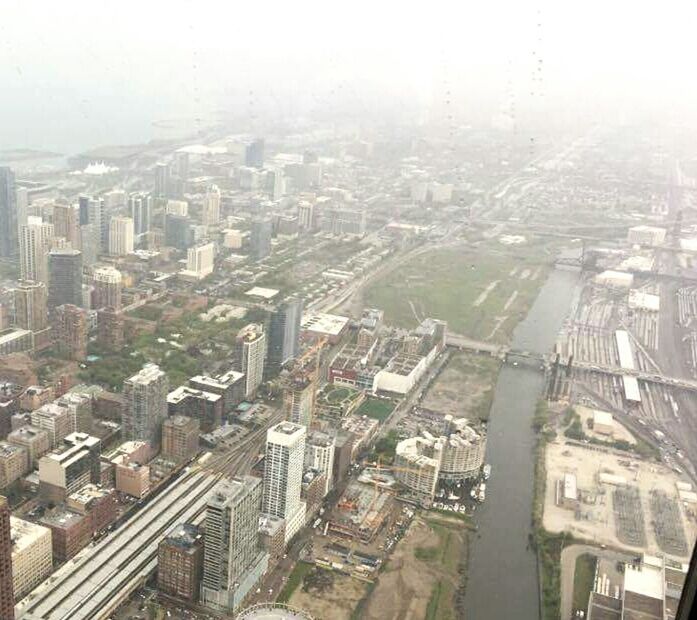 AERIAL VIEW OF CITY AGAINST SKY