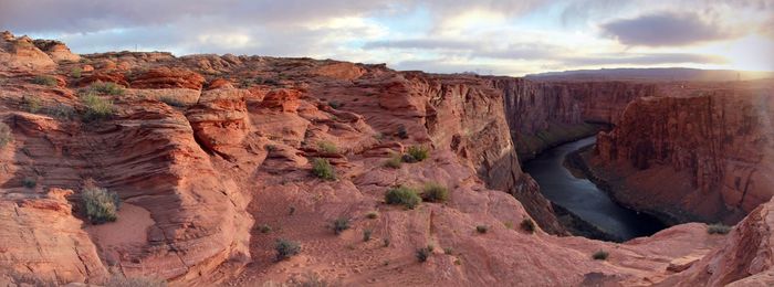 Scenic view of rock formations against sky