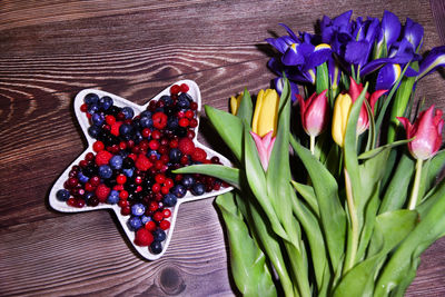 High angle view of multi colored tulips on table