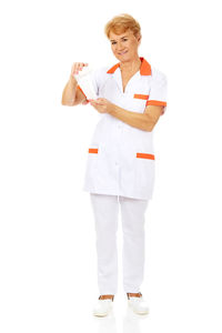 Portrait of woman standing against white background