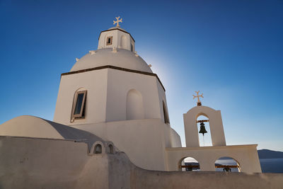 Low angle view of church against clear blue sky