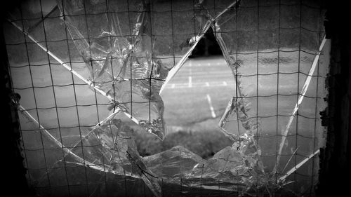 Close-up of damaged window