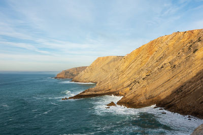 Sea cliffs landscape in cabo espichel at sunset, in portugal