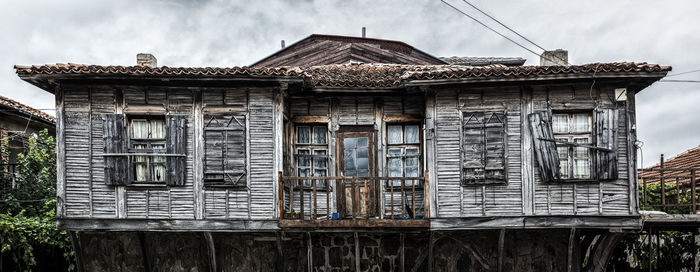 Abandoned building against sky