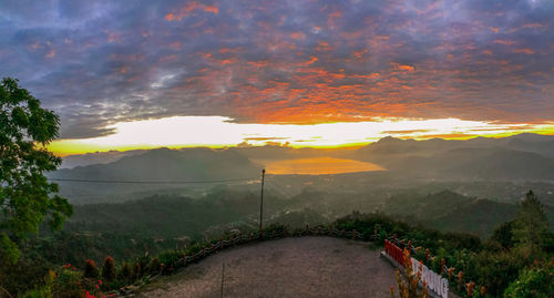 Scenic view of landscape against sky during sunset