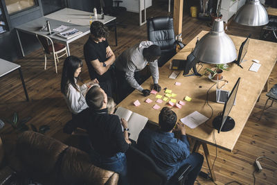 High angle view of coworkers at workplace