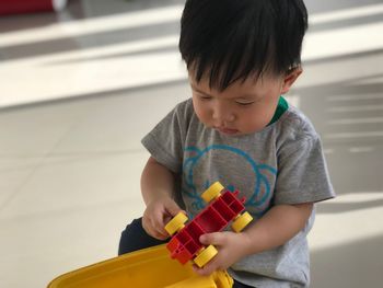 Cute girl playing with toy
