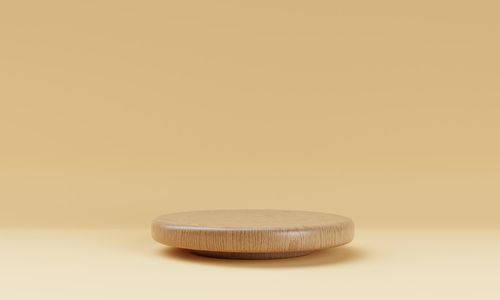 Close-up of wooden table against white background