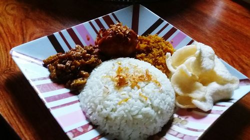 Close-up of served food on table