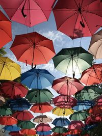 Low angle view of multi colored umbrellas