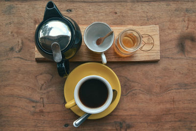 High angle view of coffee cup on table