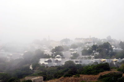 View of cityscape in foggy weather