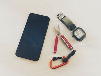 High angle view of mobile phone on table