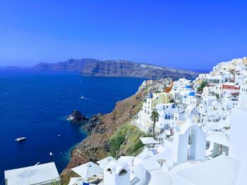 High angle view of town by sea