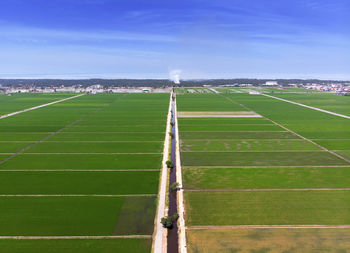Scenic view of soccer field against sky