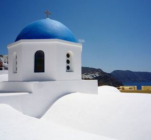 Low angle view of church against clear blue sky