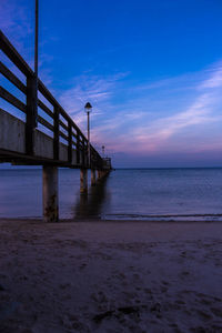 Scenic view of calm sea at sunset