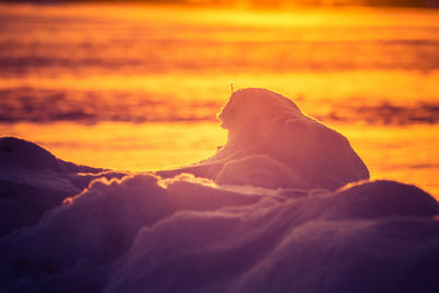 A beautiful snow surface formations in closeup. winter scenery during sunrise.
