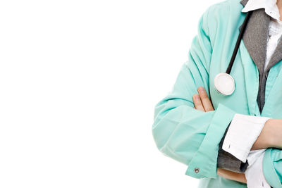 Midsection of person holding umbrella against white background