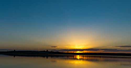 Scenic view of sunset over sea