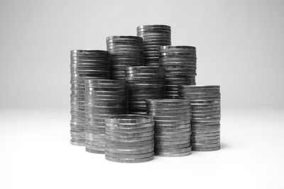 Stack of coin against white background