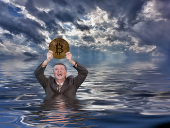 Portrait of man swimming in sea