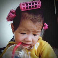 Close-up of girl having drink