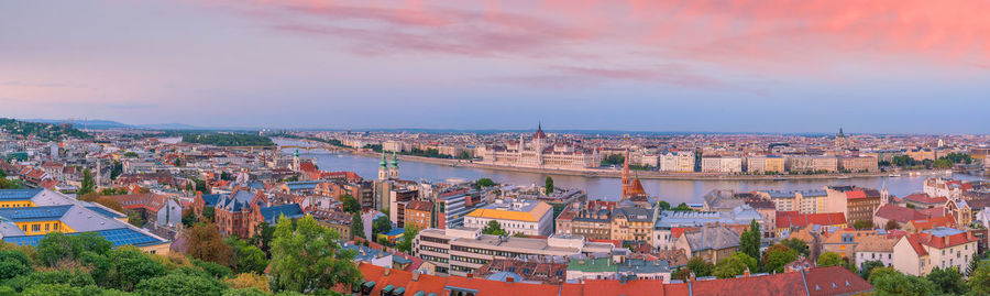 High angle view of townscape against sky during sunset