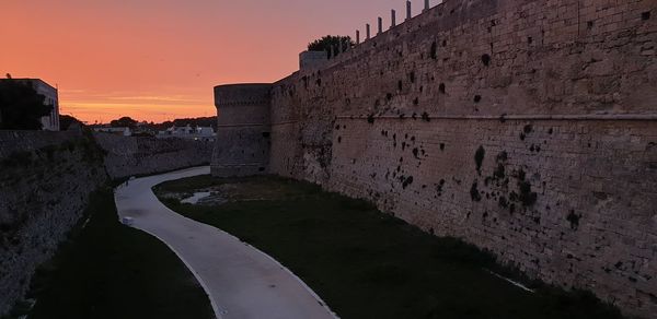 View of buildings against sky during sunset