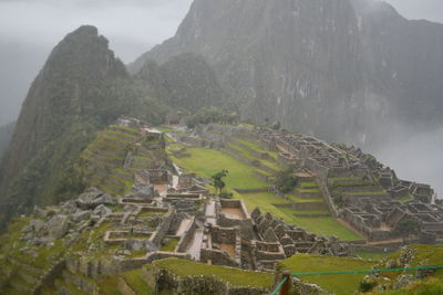 High angle view of old ruins in mountains