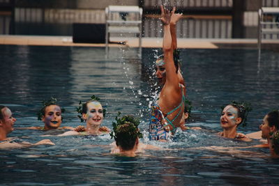 Group of people in swimming pool