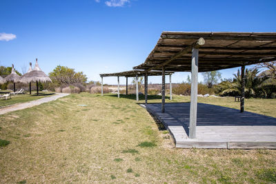Built structure on field against clear sky