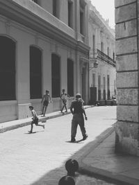 Children playing in city