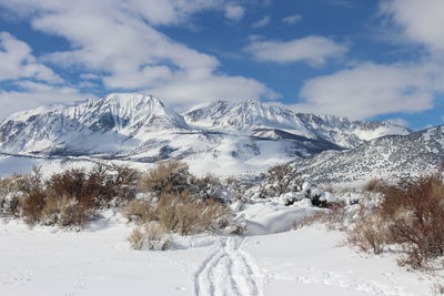 Snowcapped mountains against sky