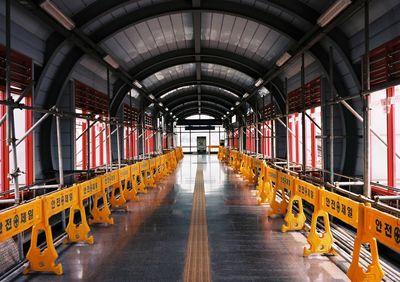 Barricades in empty covered footbridge