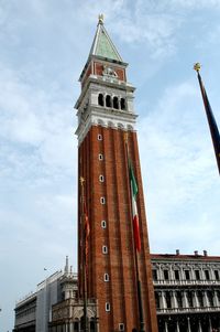 Low angle view of clock tower against sky