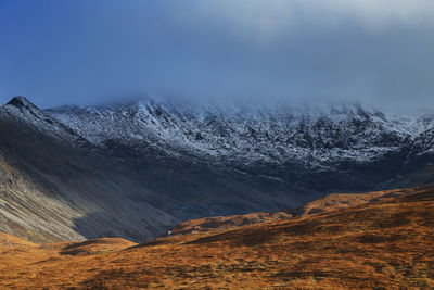 Scenic view of mountains against sky