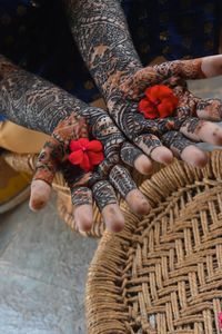 High angle view of people holding flower bouquet