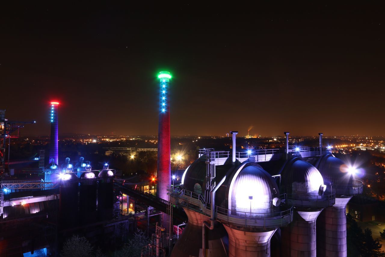 ILLUMINATED CITY AT NIGHT