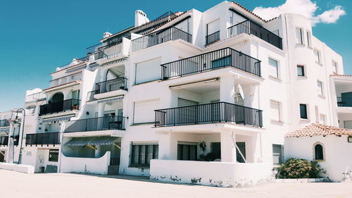 Exterior of residential building against sky